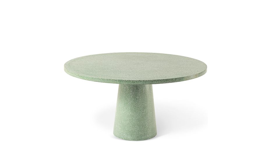 Además de sillones Dine Out también incluye una mesa circular del mismo autor.