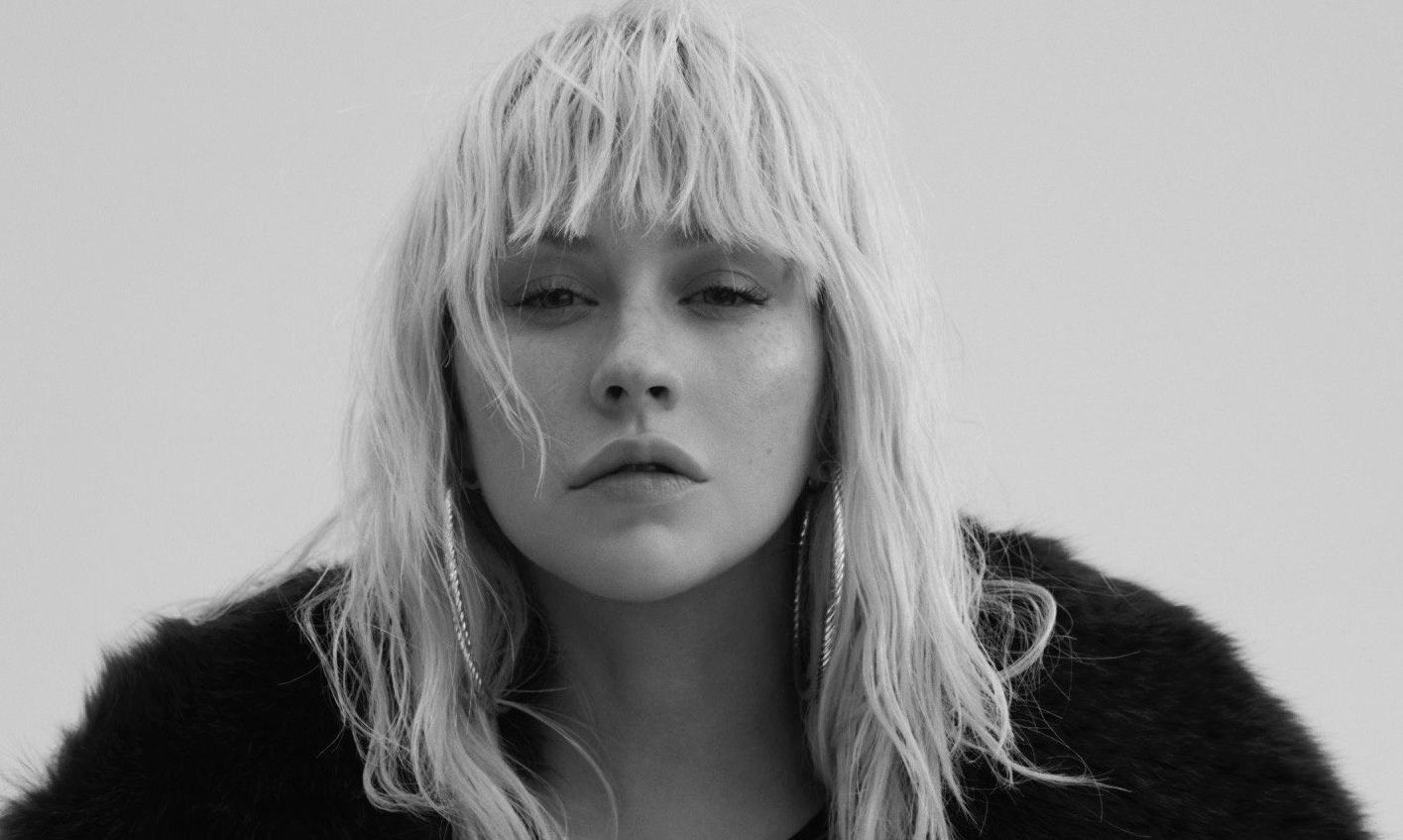 Finalmente, en el 2018 sacó su séptimo álbum, "Liberation" y reafirmó su imagen rubia con labios rojos