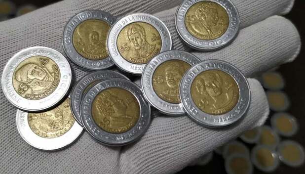 Estas monedas de "caritas" de 5 pesos, ¡valen hasta 55 mil!