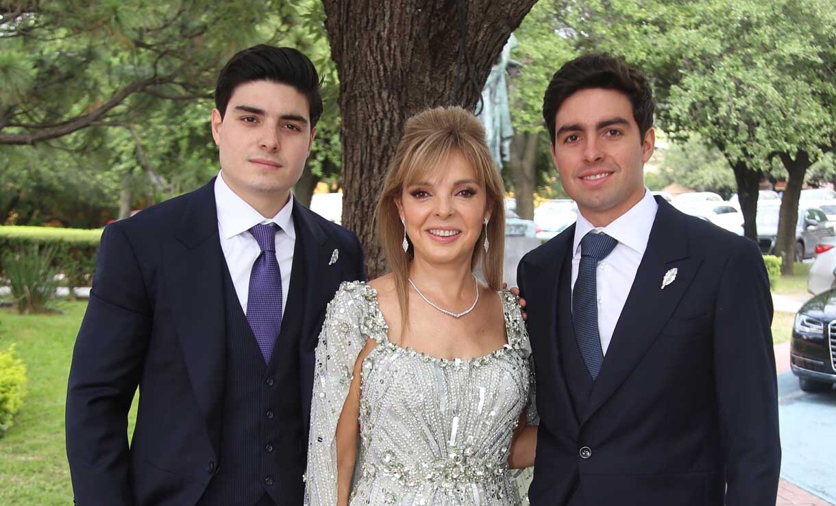 Alex Garza, Marcela Botello de Garza y Charly Garza