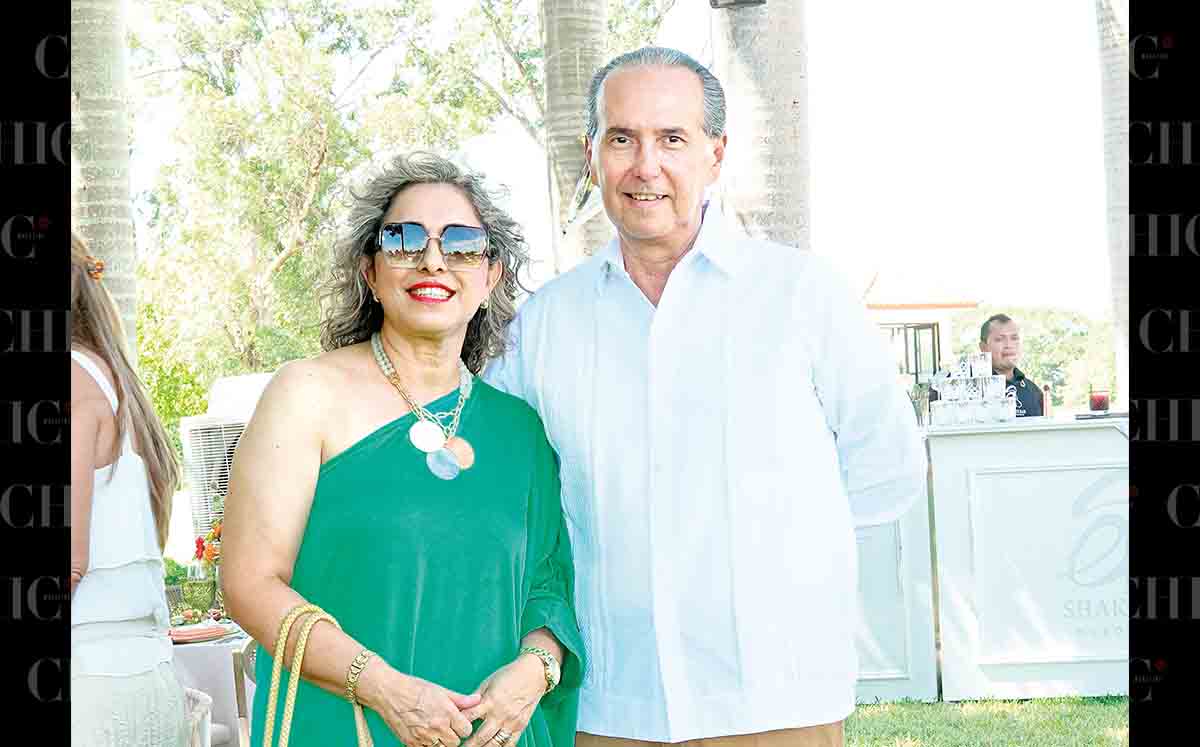 LORENA MIGUEL Y CARLOS CHAVARRIA llegaron con sus mejores outfits al bautizo de Ana María