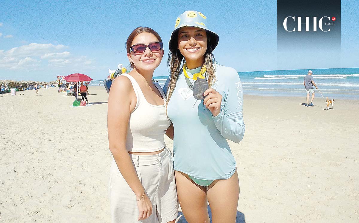 FER CRUZ junto a SYLVIA PASCUAL ganadora del tercer lugar en el torneo de surf