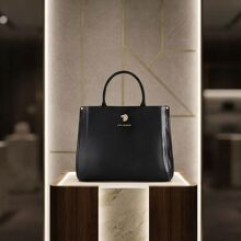 Liverpool remata bolso Prada de piel vegana por el Hot Sale 2026 (Foto: IA/Liverpool/Prada)